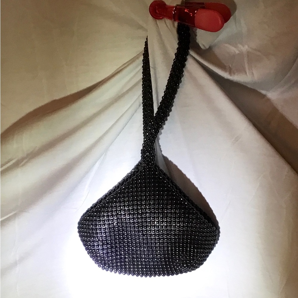 Size 6” W x 6” H, wristlet is 7”.